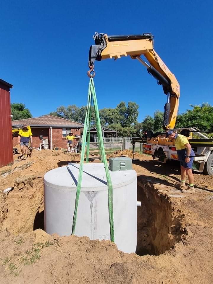 Crane lifting in a septic waste water tank